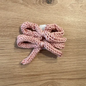 Pack 2 lazos con pinza rosa empolvado