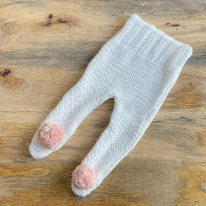 Polaina blanca pompón rosa empolvado