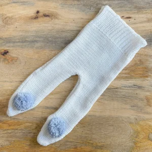 Polaina blanca pompón azul empolvado