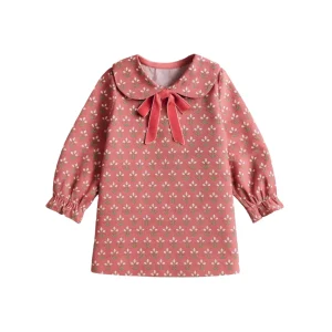 Vestido rosa cuello redondo y lazada